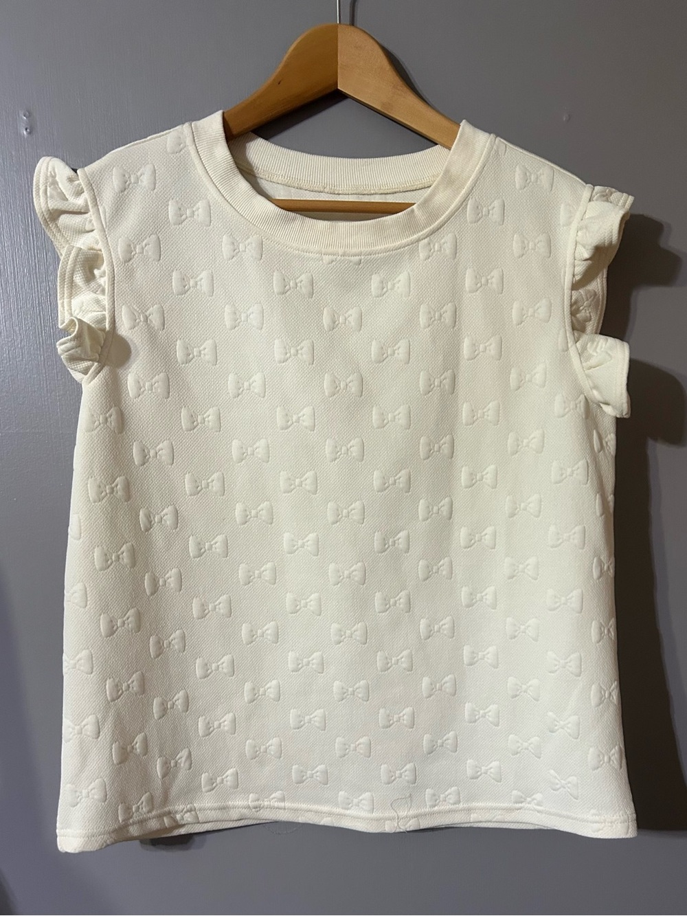 Ivory Bow-Embossed Ruffle Sleeve Top Size Medium